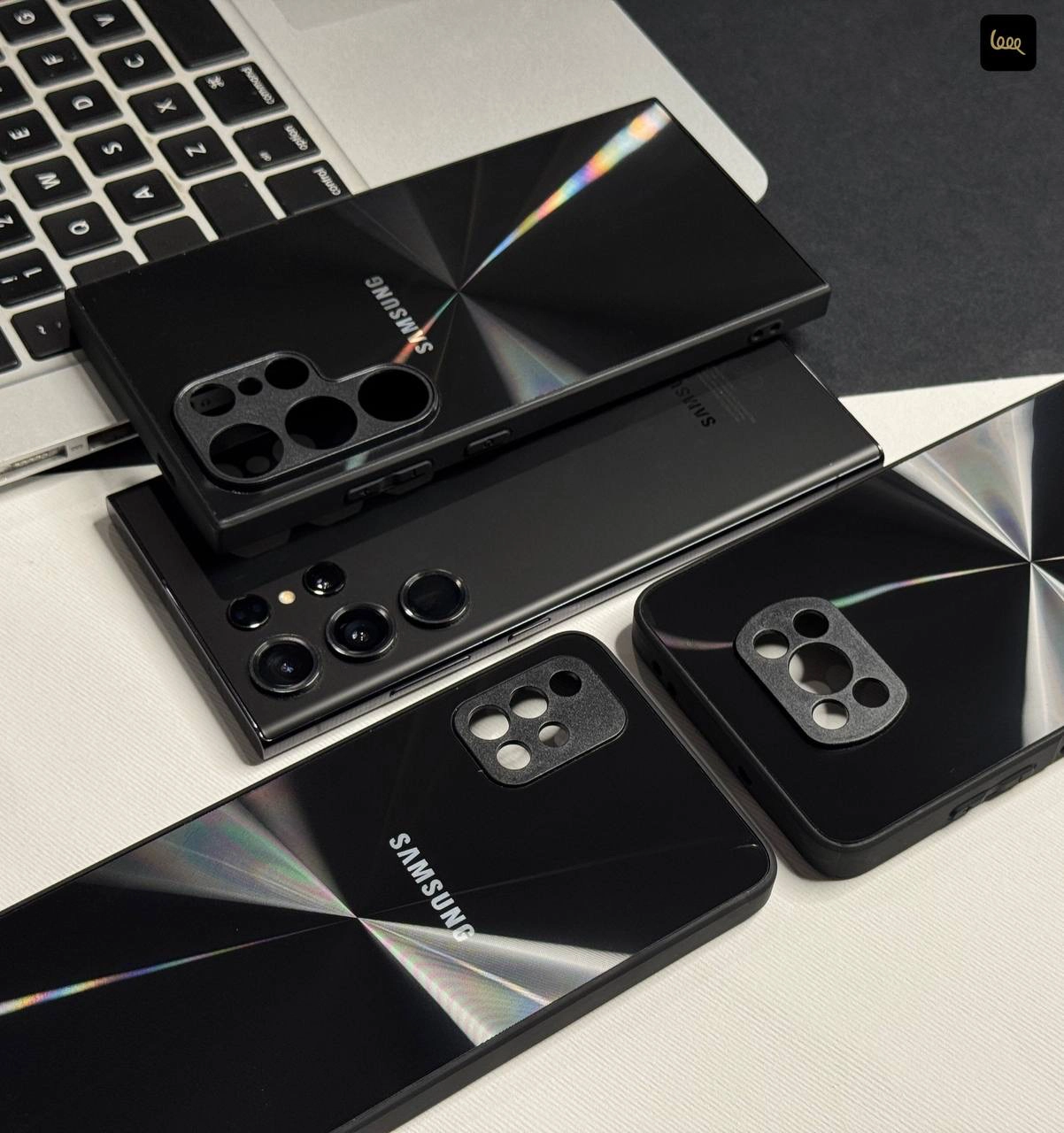 قاب گوشی لیزری مشکی کلاسیک با طرح لیزری روی بدنه و لبه‌های محافظ دوربین برای مدل‌های سامسونگ، شیائومی و آیفون