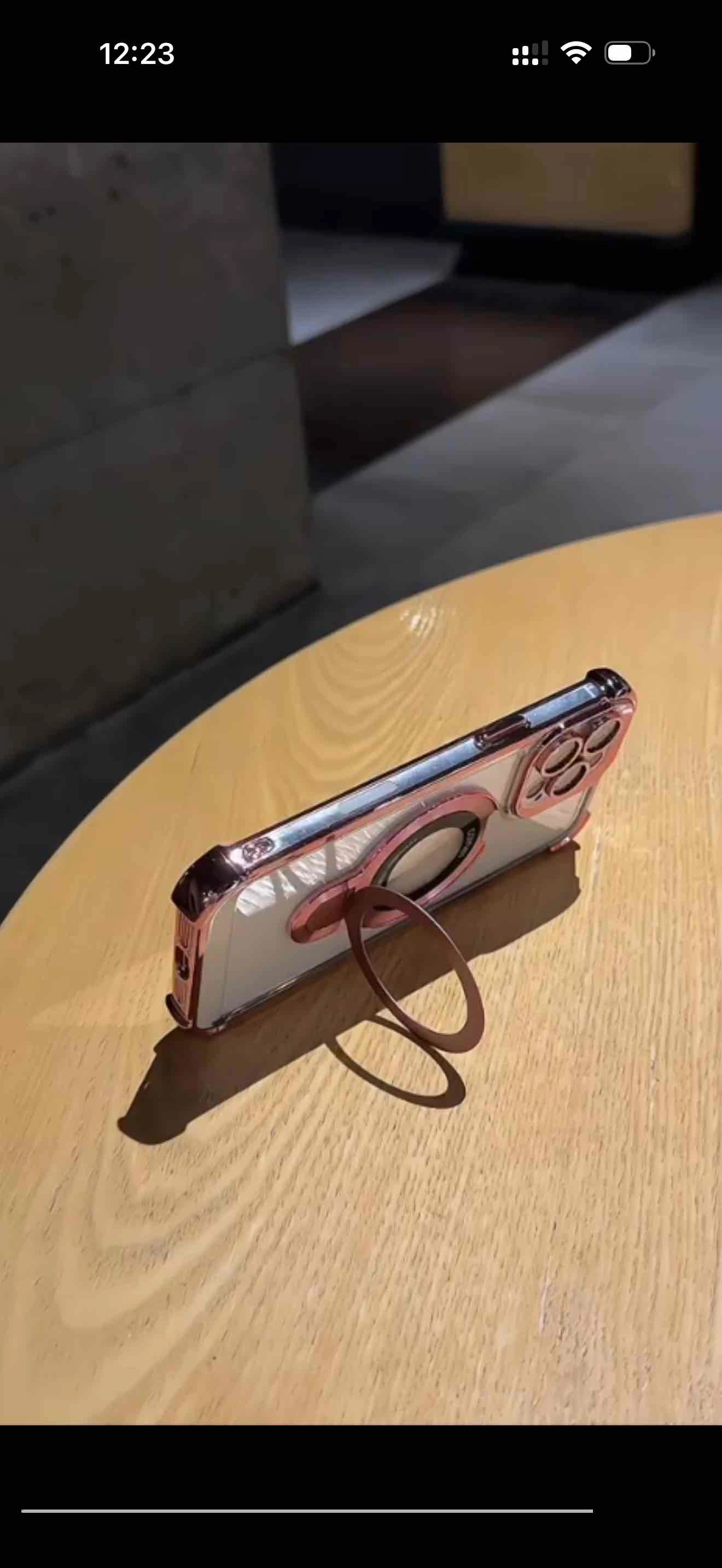 قاب گوشی Aircosion Coinball case شفاف در سه رنگ مشکی و طلایی و رزگلد دارای استند تاشو و ایرکوشن