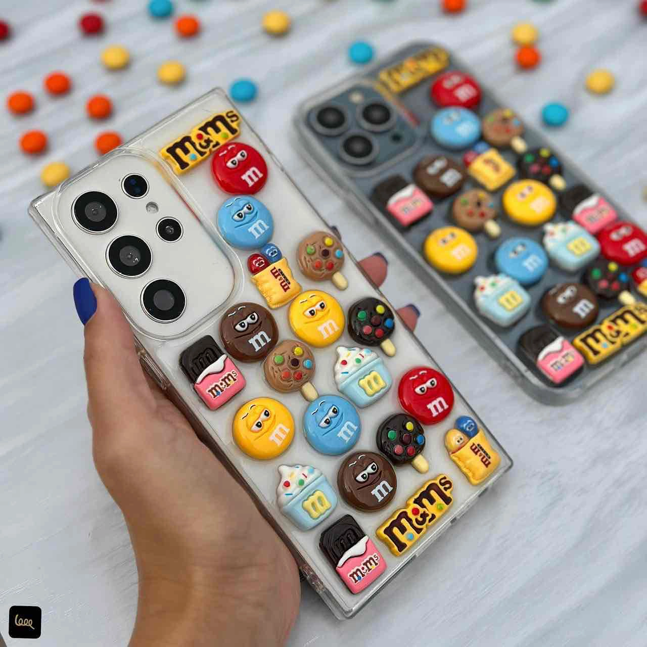 قاب گوشی سهبعدی طرح M&M رنگارنگ روی گوشی قاب گوشی سهبعدی طرح M&M رنگارنگ روی گوشی