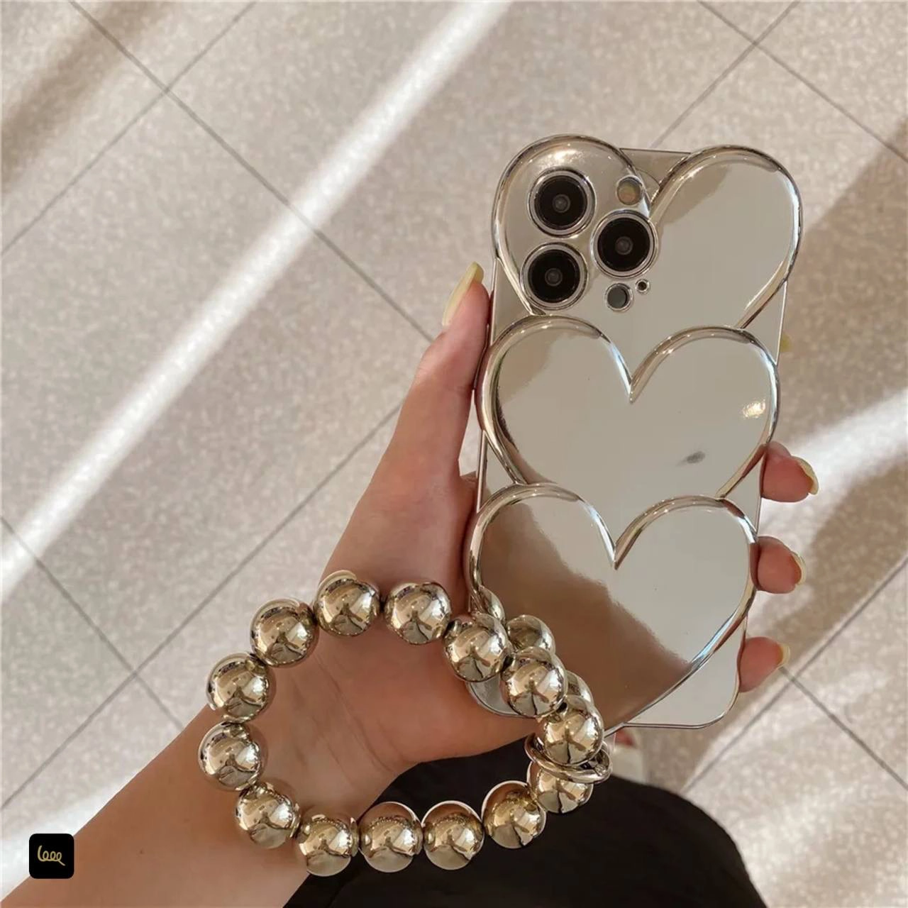 قاب آیفون Heart Mirror 3D قلبی آینه‌ای نقره‌ای با بند مرواریدی کروم 
